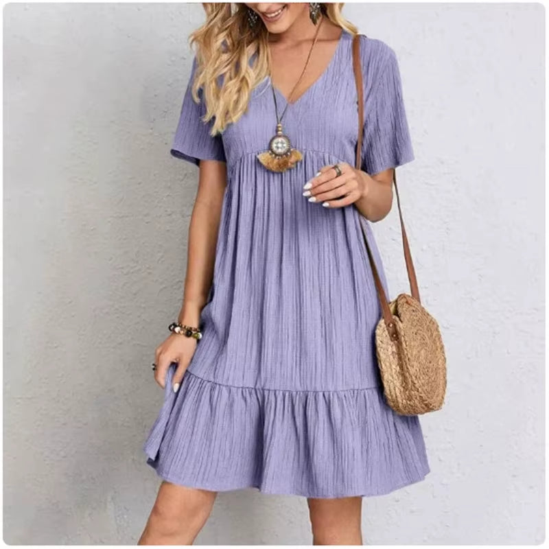 Elevate Your Summer Wardrobe with Our Women’s V-Neck Peplum Dress – Perfect for Vacations and Beach Days!